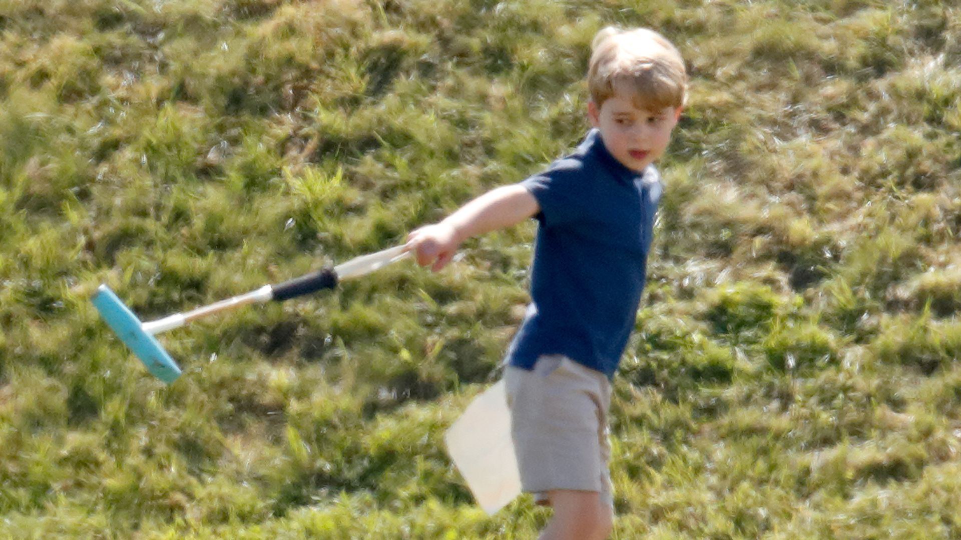 Prince George with a polo mallet