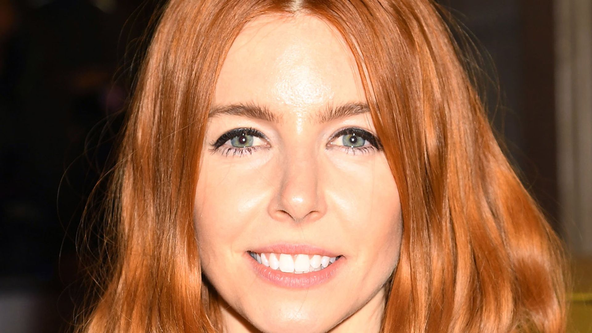 stacey dooley smiles for camera 