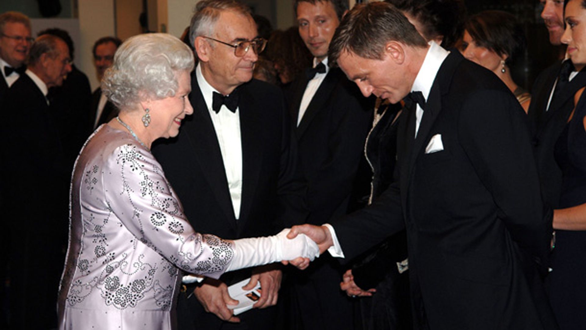 Daniel Craig and wife Rachel Weisz dine with the Queen