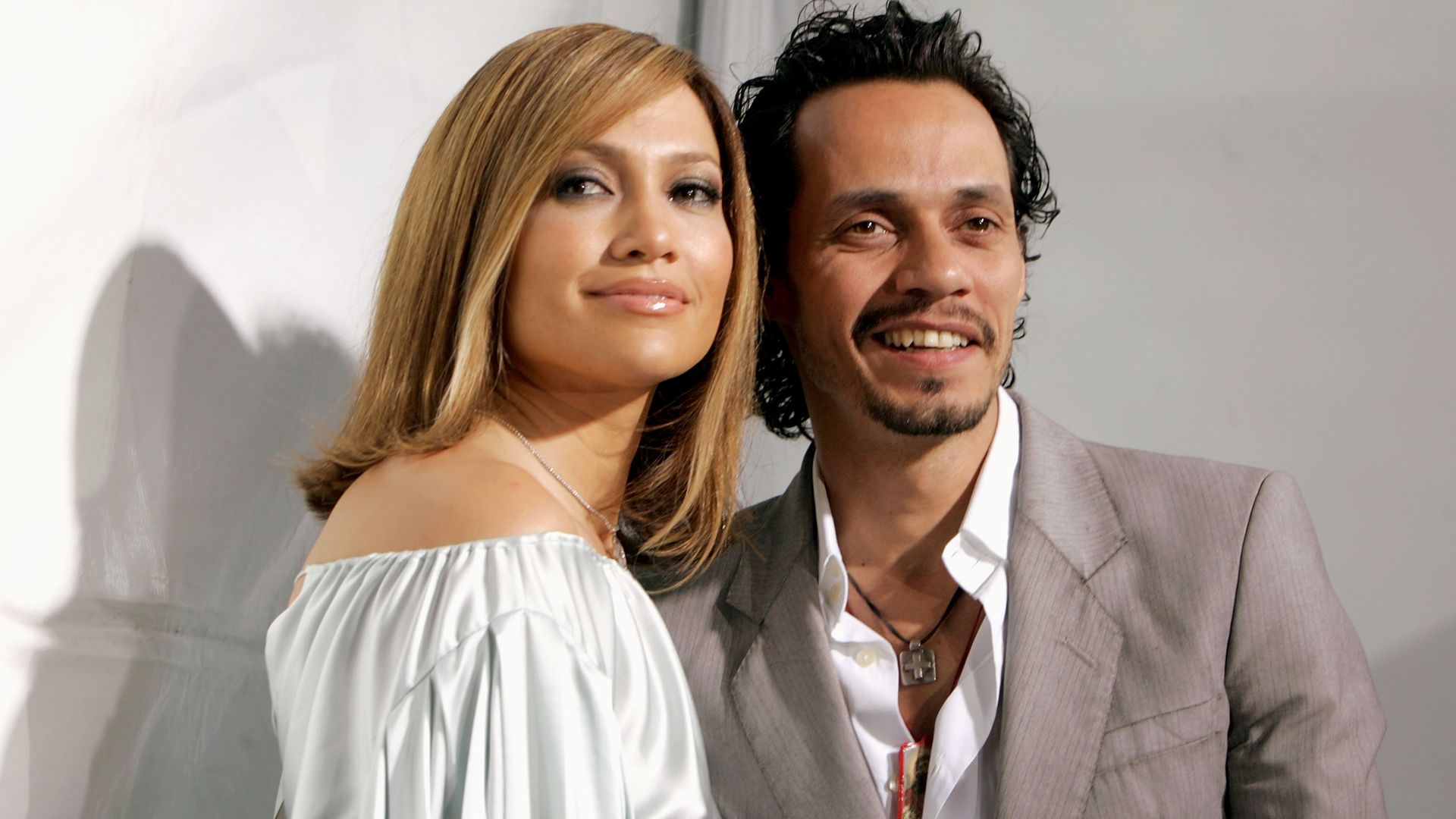 WESTWOOD, CA - APRIL 29:  Actress Jennifer Lopez (L) and her husband musician Marc Anthony arrive at New Line Cinema's Premiere of "Monster In Law" at the Mann National Theatre on April 29, 2005 in Westwood, California.  (Photo by Kevin Winter/Getty Images)