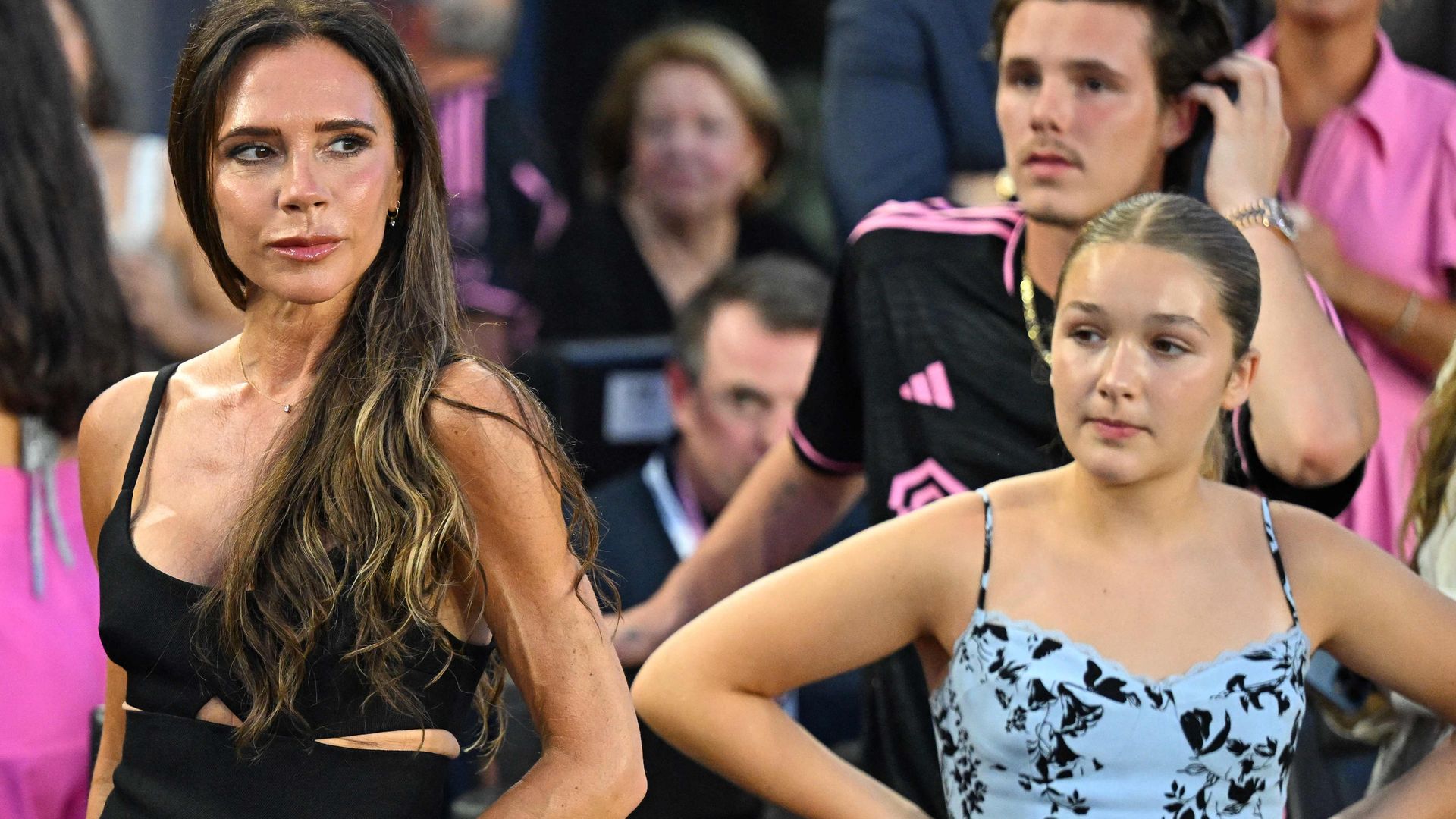 Victoria Beckham and daughter Harper Beckham look on during the Leagues Cup Group J football match between Inter Miami CF and Cruz Azul at DRV PNK Stadium in Fort Lauderdale, Florida, on July 21, 2023.