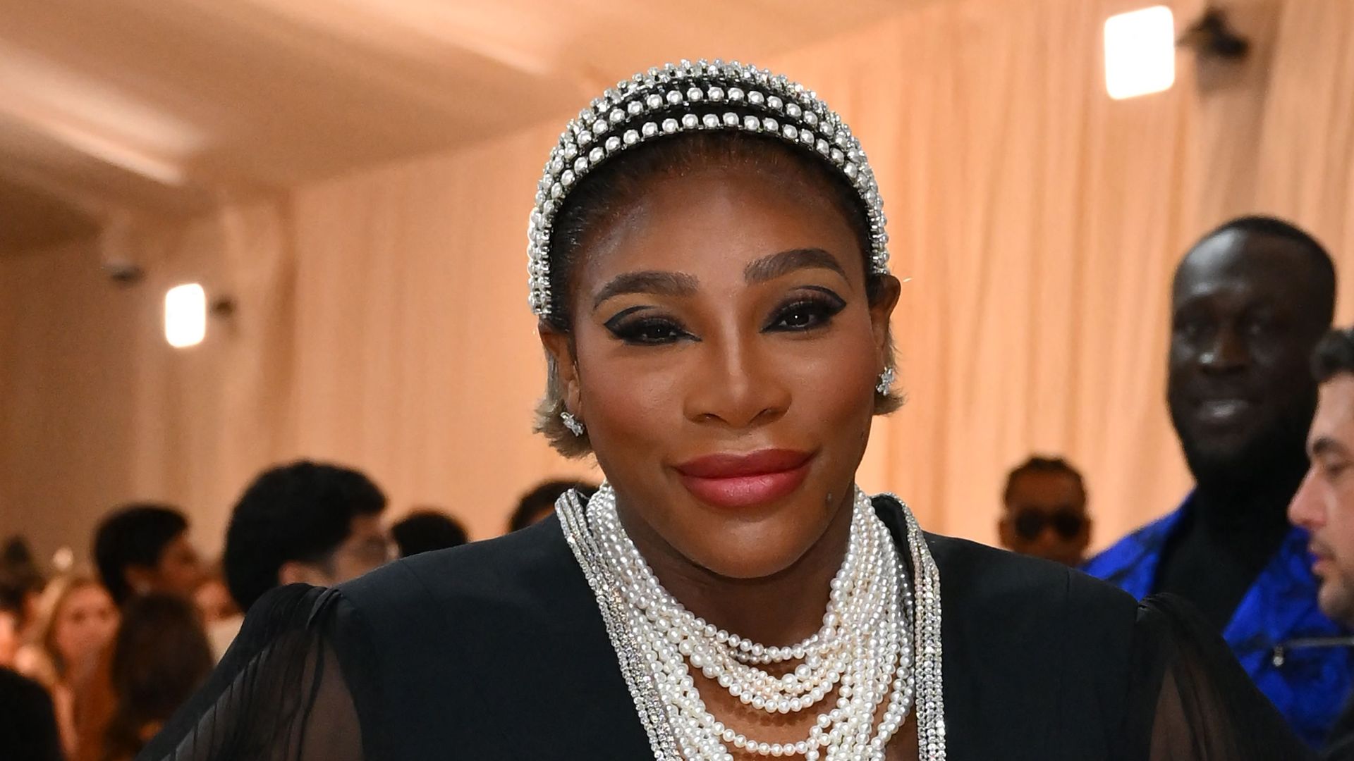 Serena Williams showcases baby bump in bra and mini skirt after Met