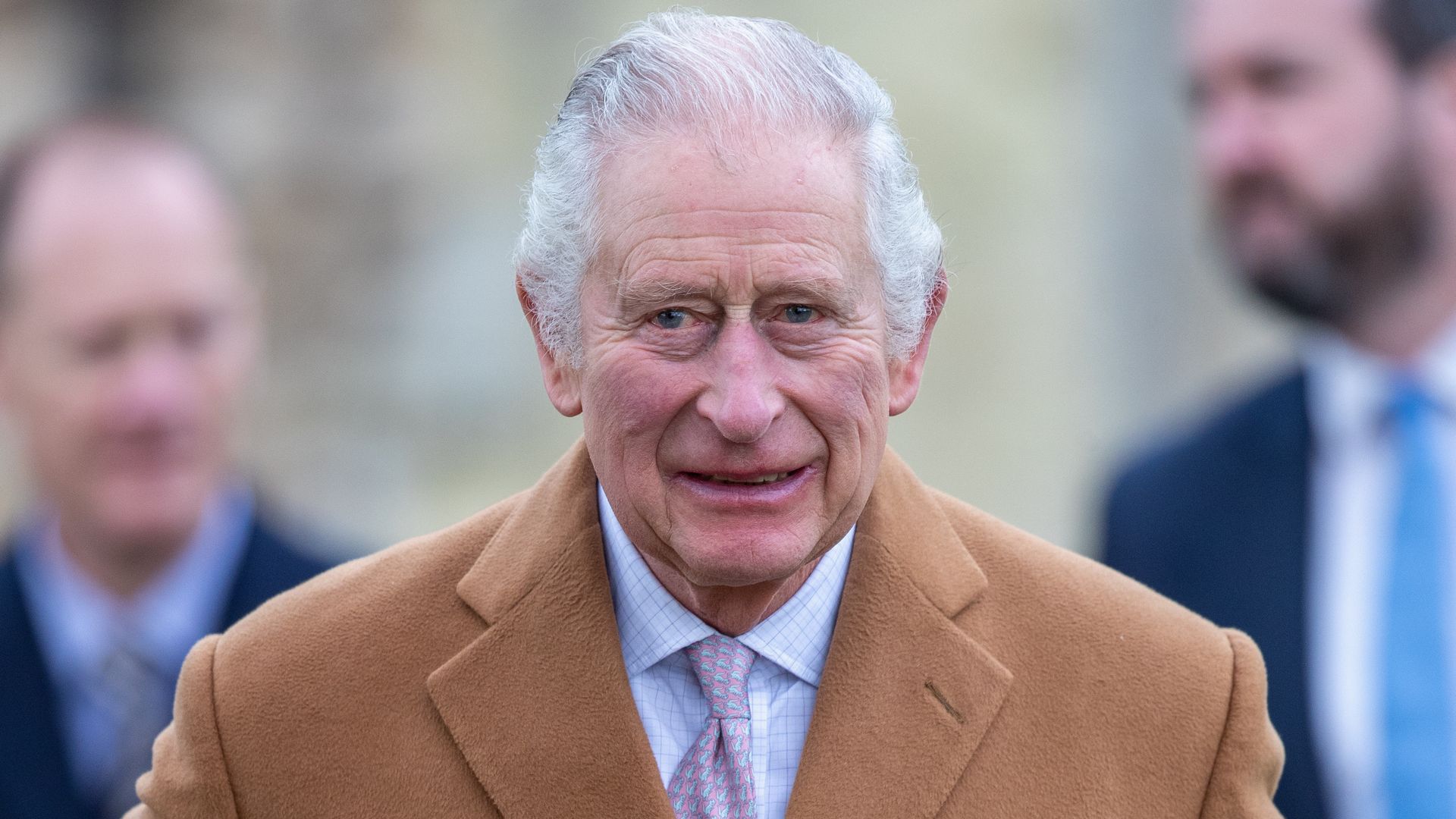 King Charles in brown coat