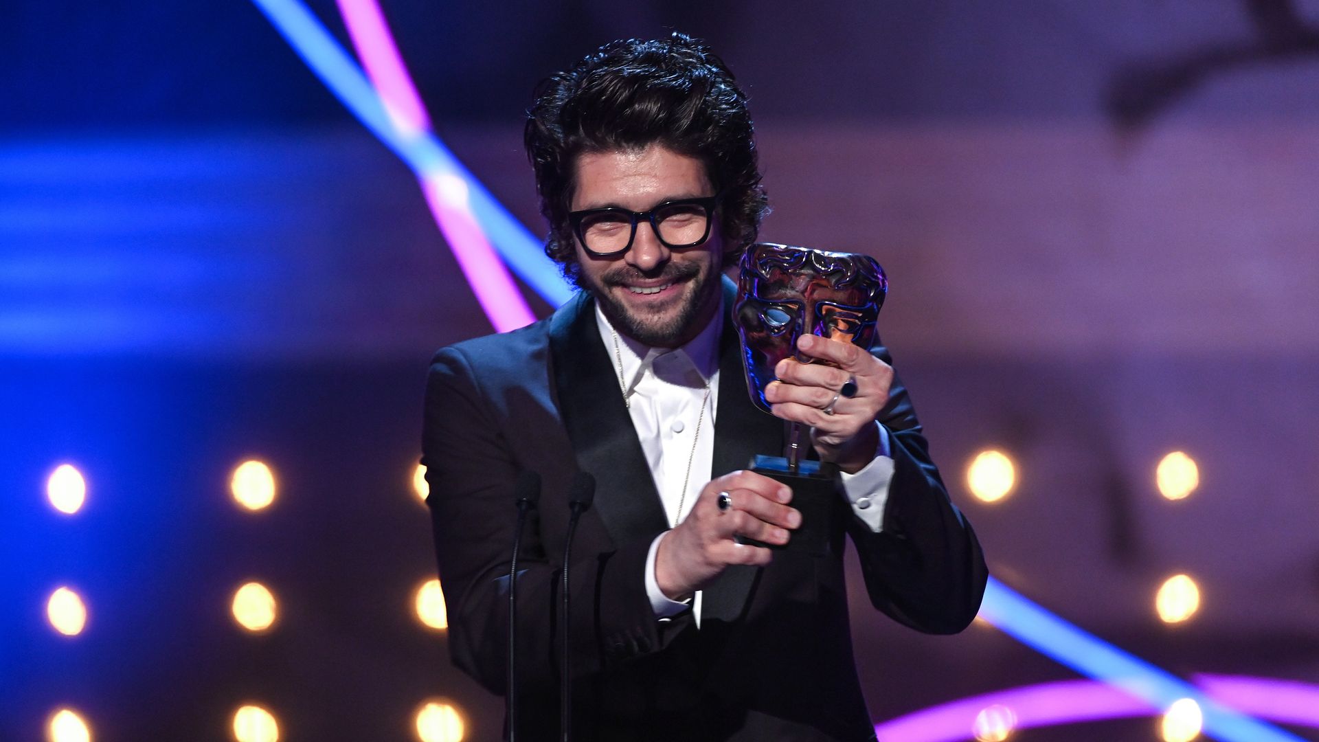 Ben Whishaw accepts the Leading Actor Award for his performance in 'The Is Going To Hurt' at the 2023 BAFTA Television Awards 
