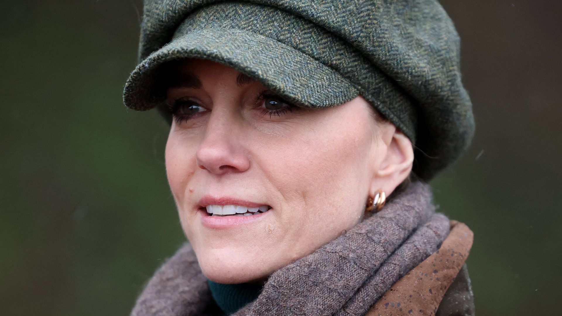 Britain's Catherine, Princess of Wales, looks on during a guided walk in the Peak District with members of the Mind Over Mountains charity, near Curbar, northern England on January 27, 2026. (Photo by Ian Vogler / POOL / AFP via Getty Images)