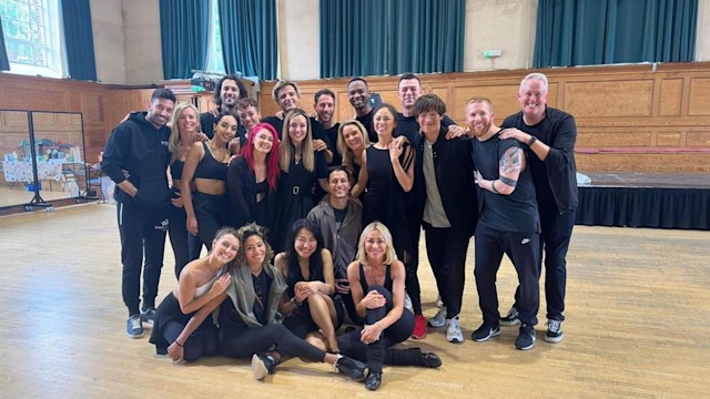 amy dowden surrounded by fellow strictly stars 