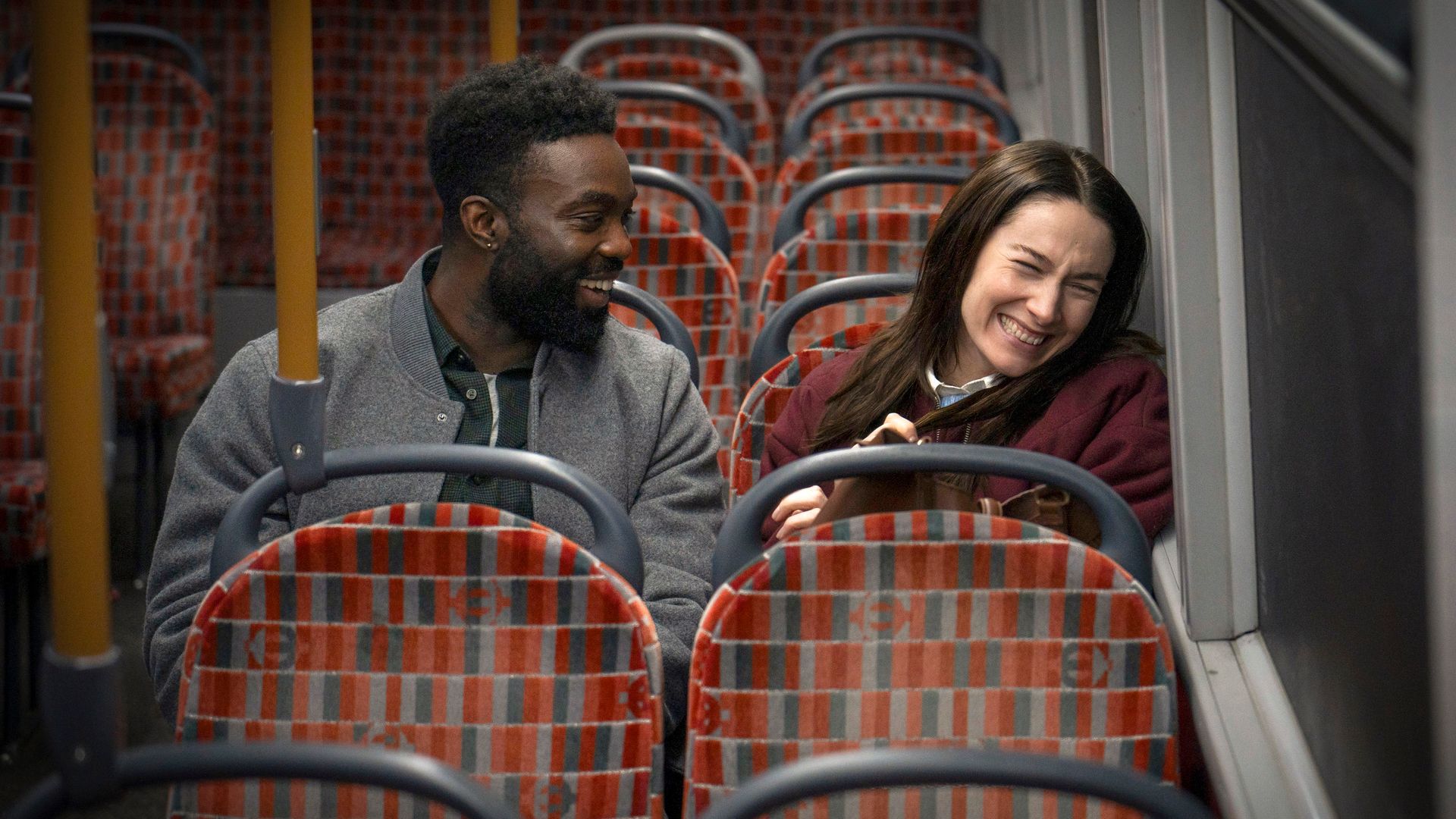 man and woman on bus
