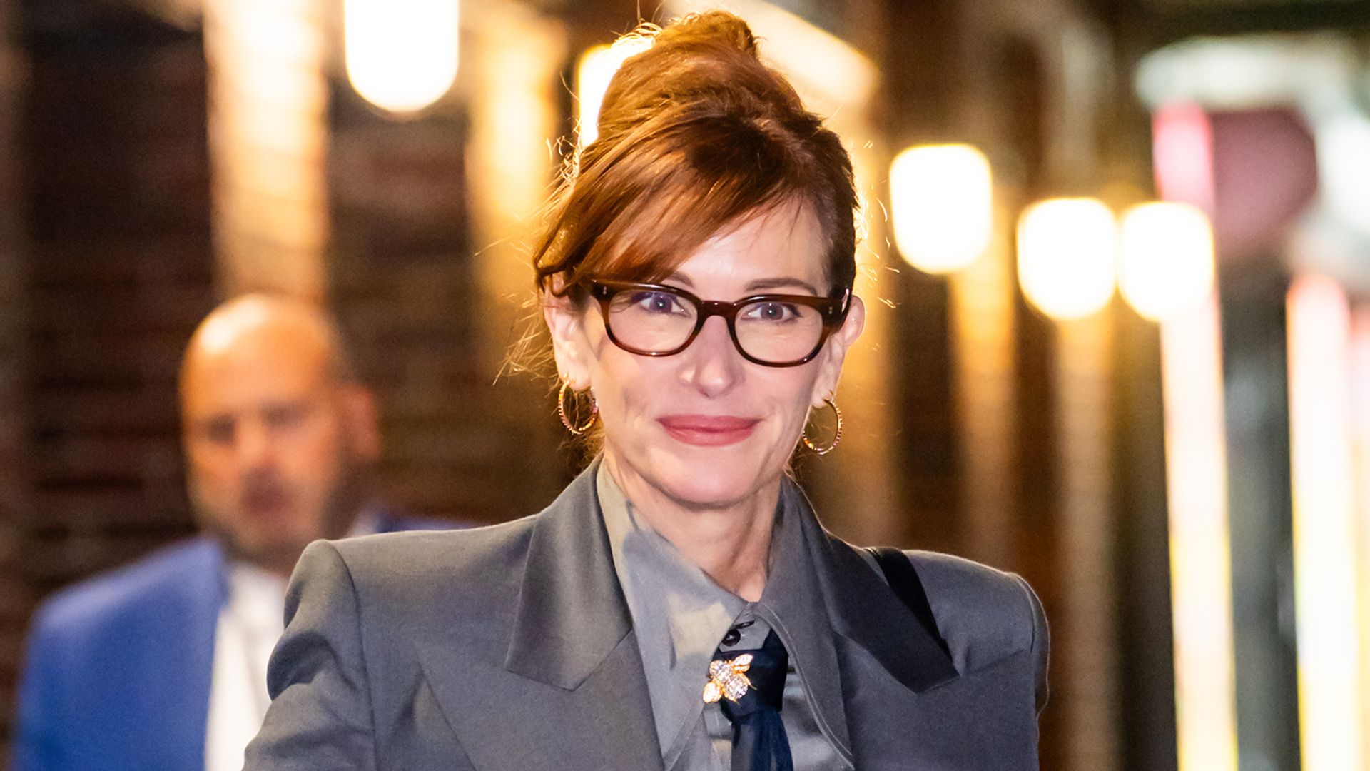 Julia Roberts in gray suit seen leaving "The Late Show With Stephen Colbert" at Ed Sullivan Theater 