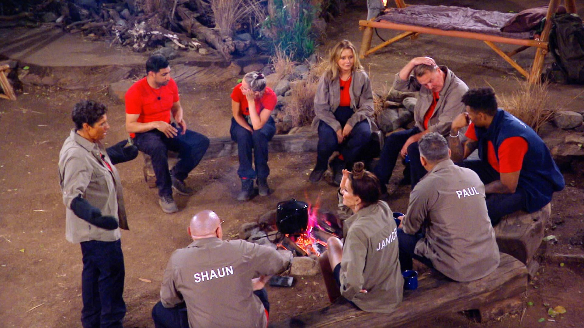 The I'm A Celebrity 2023 campmates sitting around the fire