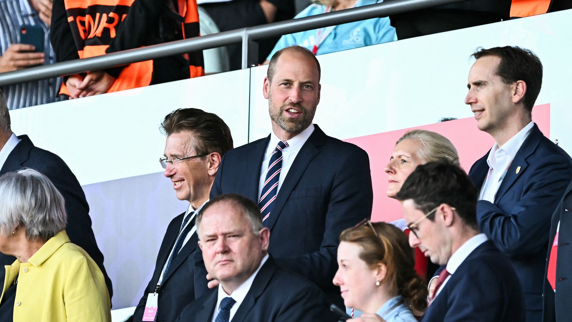 Prince William in a crowd of football fans