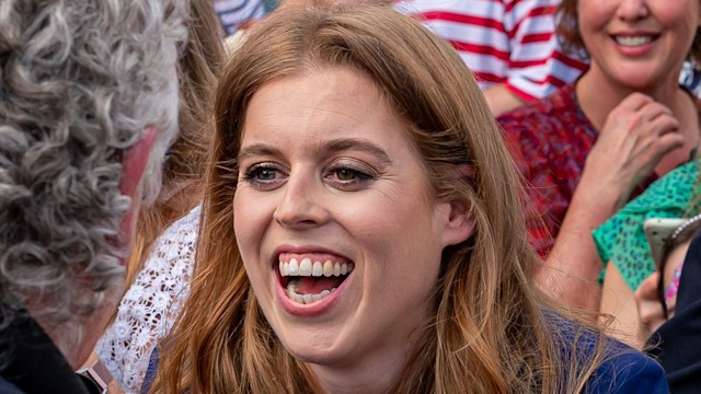 Princess Beatrice laughing at Coronation Big Lunch in Chalfont St Giles