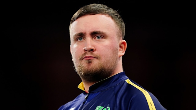 Luke Littler during their semi-final match against Stephen Bunting on day fifteen of the Paddy Power World Darts Championship at Alexandra Palace, London