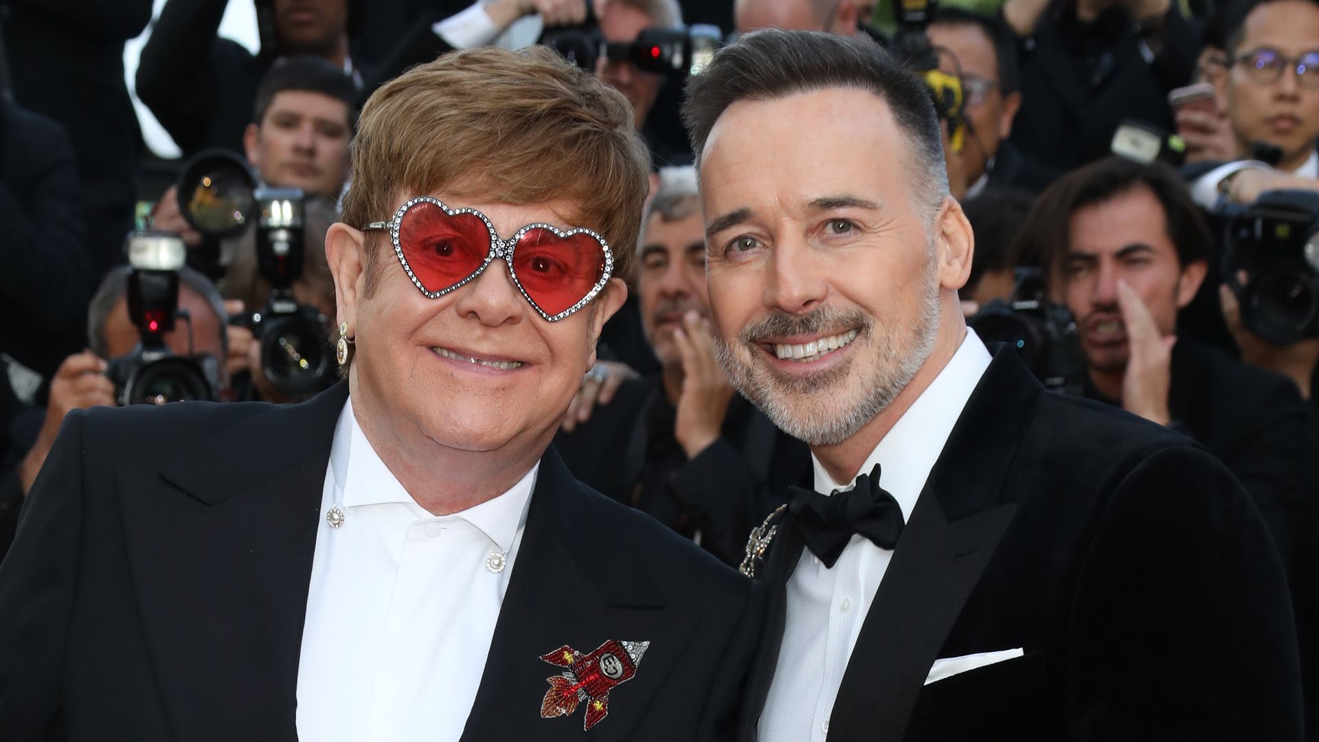 Elton John and David Furnish attend the screening of "Rocket Man" during the 72nd annual Cannes Film Festival on May 16, 2019