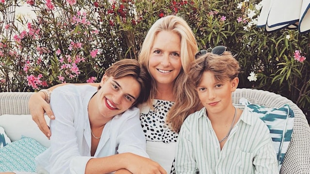 Penny Lancaster with sons outside