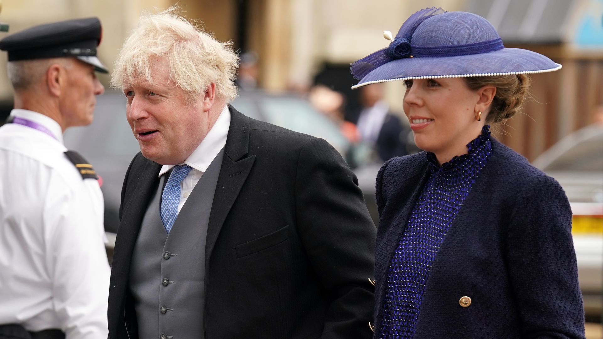 Boris and Carrie Johnson walking hand in hand