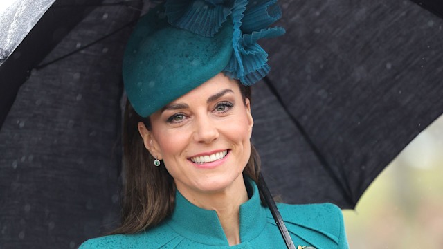 Kate Middleton holding an umbrella