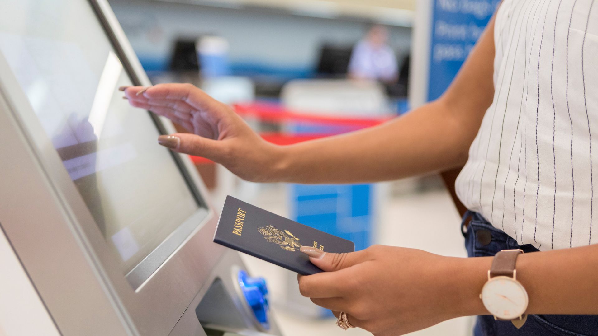 Female traveler checks in at the airport