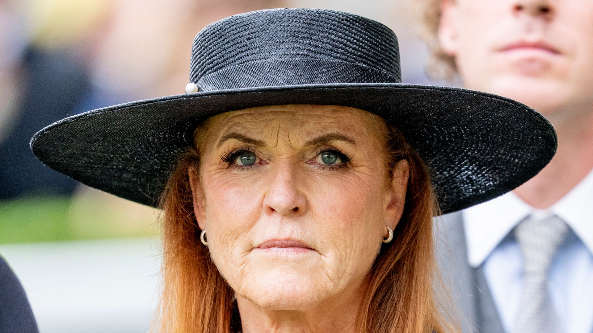 Sarah Ferguson wearing wide-brimmed black hat