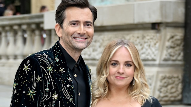 David Tennant in an embellished velvet suit and Georgia Tennant in a black dress