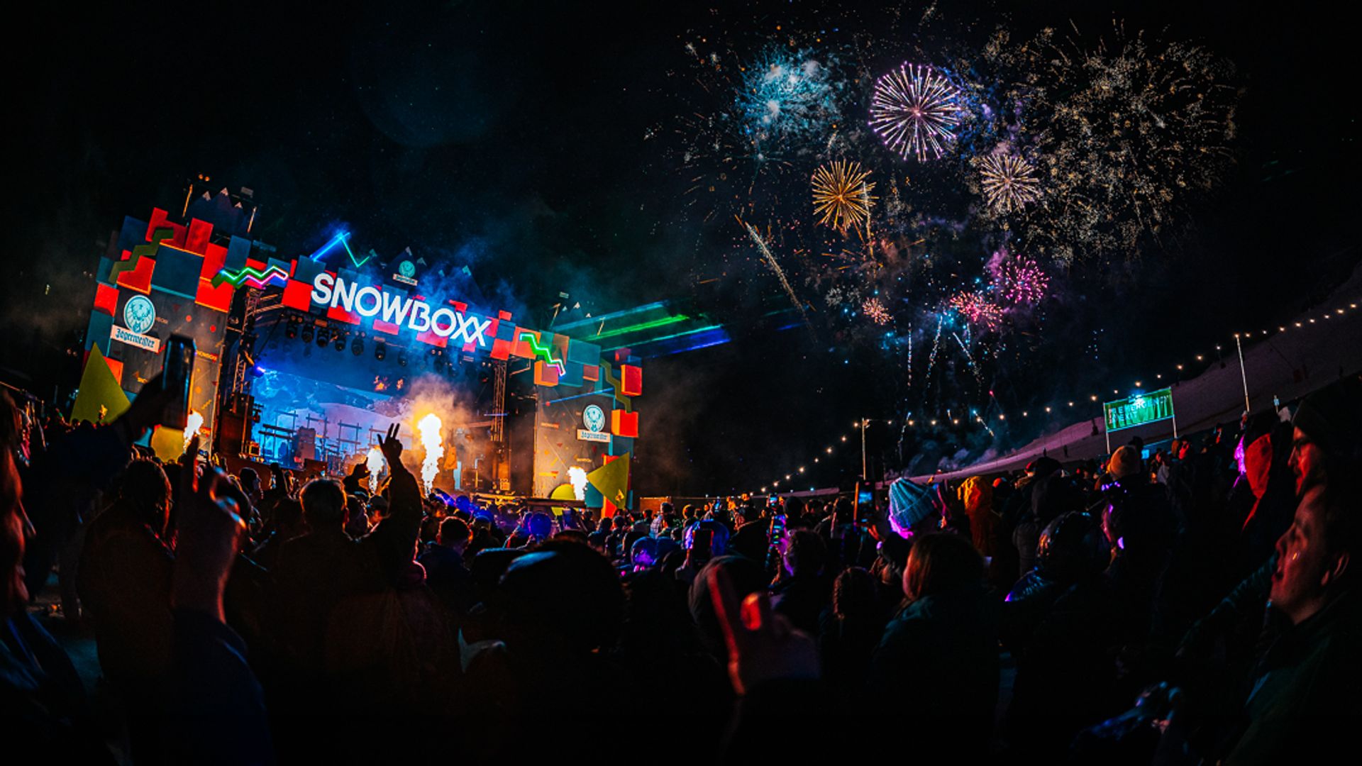 Fireworks next to a Snowboxx festival stage