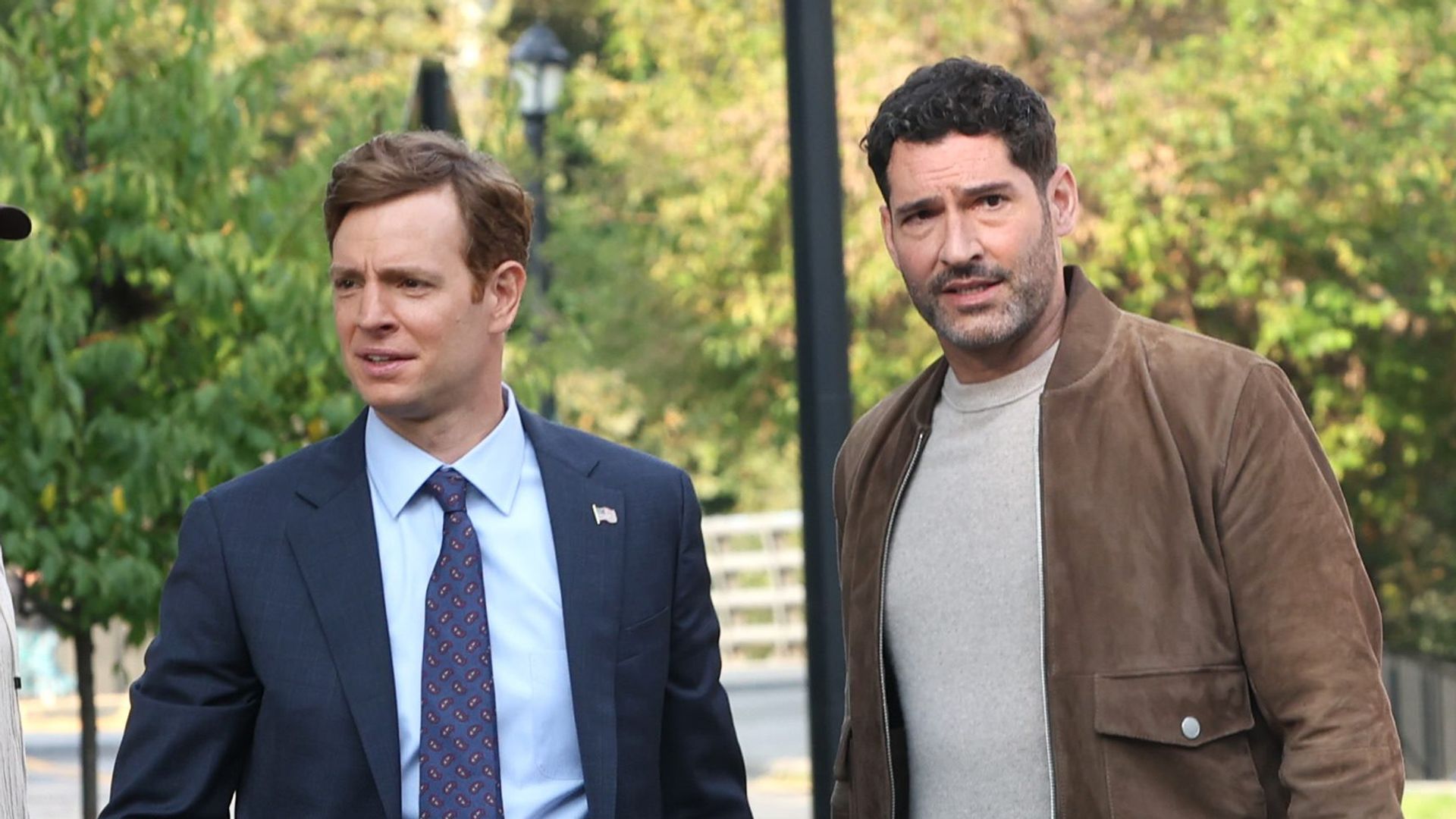 Nick Gehlfuss and Tom Ellis are seen on the set of "CIA" in Flushing Meadows Park, Queens on September 23, 2025 in New York City