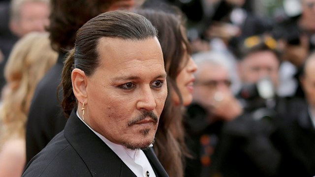 Johnny Depp attends the "Jeanne du Barry" Screening & opening ceremony red carpet at the 76th annual Cannes film festival at Palais des Festivals on May 16, 2023 in Cannes, France