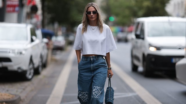 Kathrin Bommann wearing a white T-shirt with jeans 