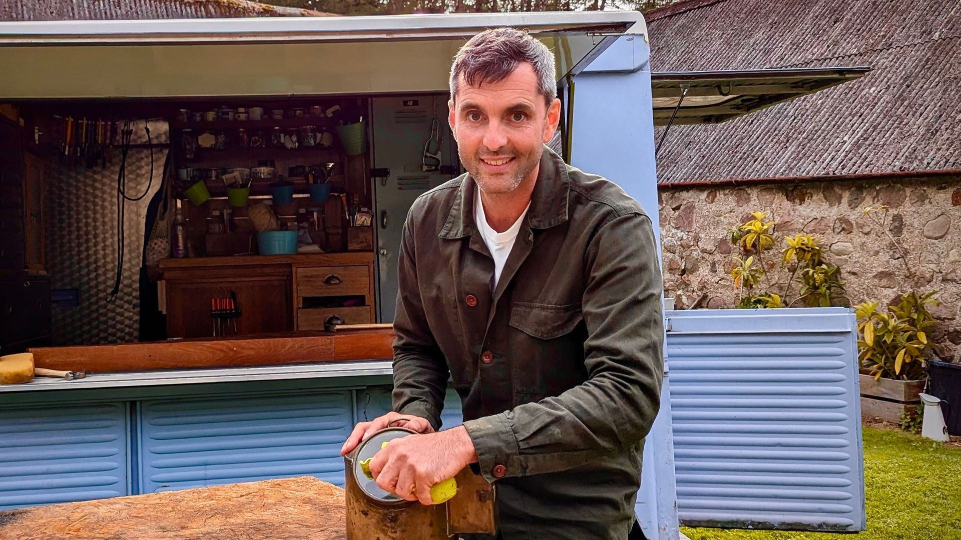 Robin Johnson working on a project by The Travelling Auctioneers van