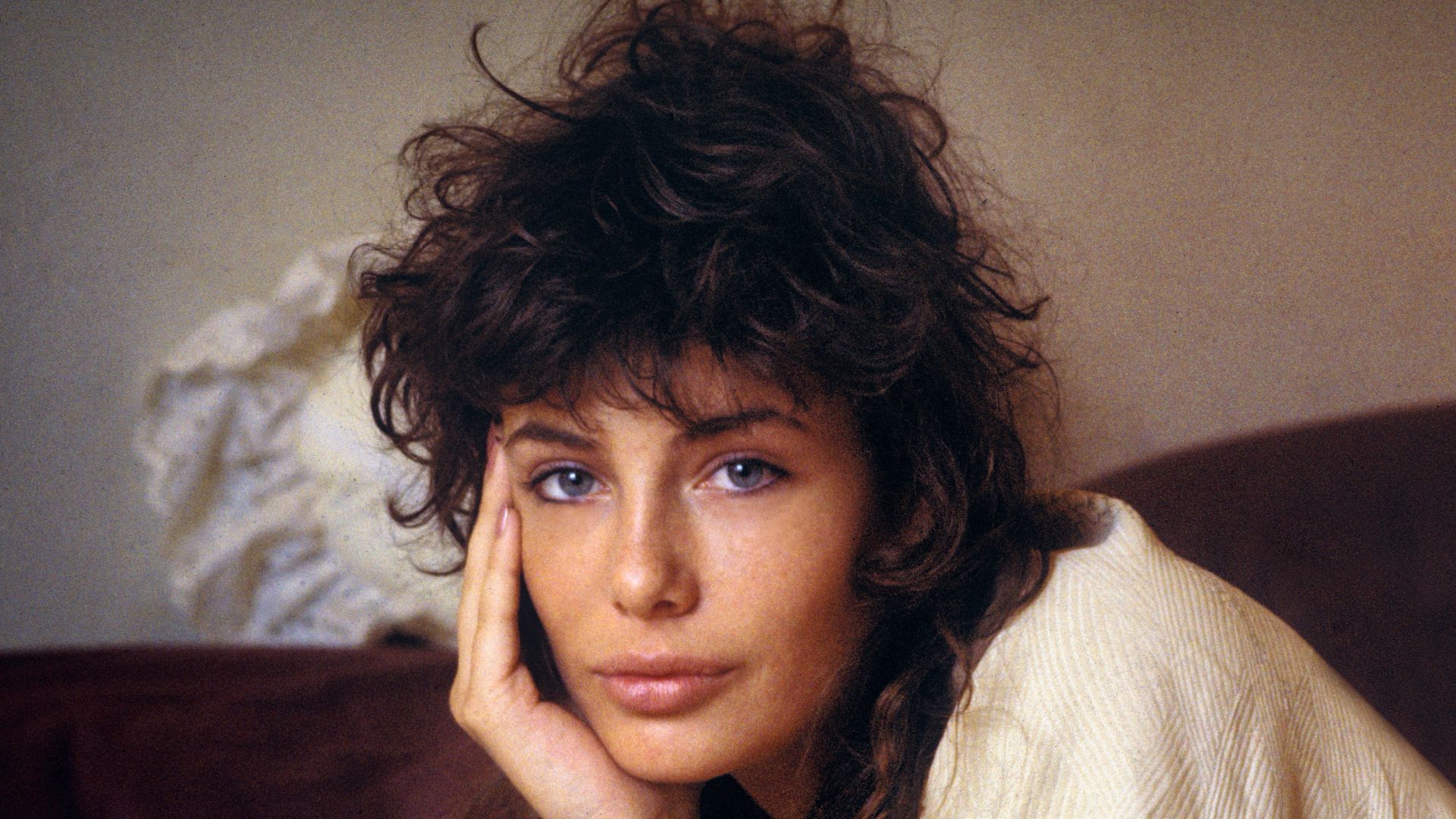 photo of kelly lebrock on a bed
