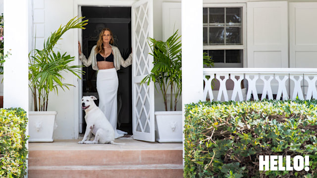 Woman in tropical setting with dog