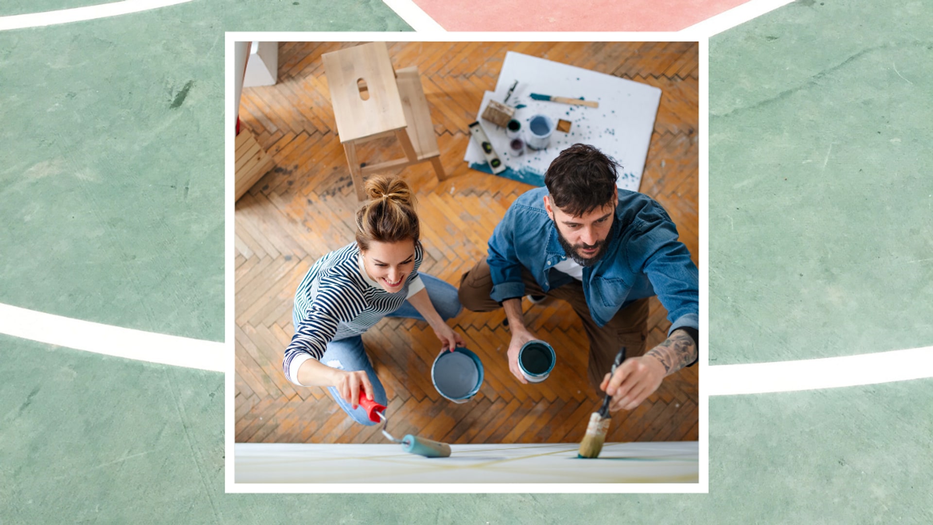 DIY couple painting in casual clothes