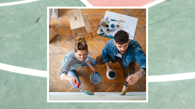 DIY couple painting in casual clothes