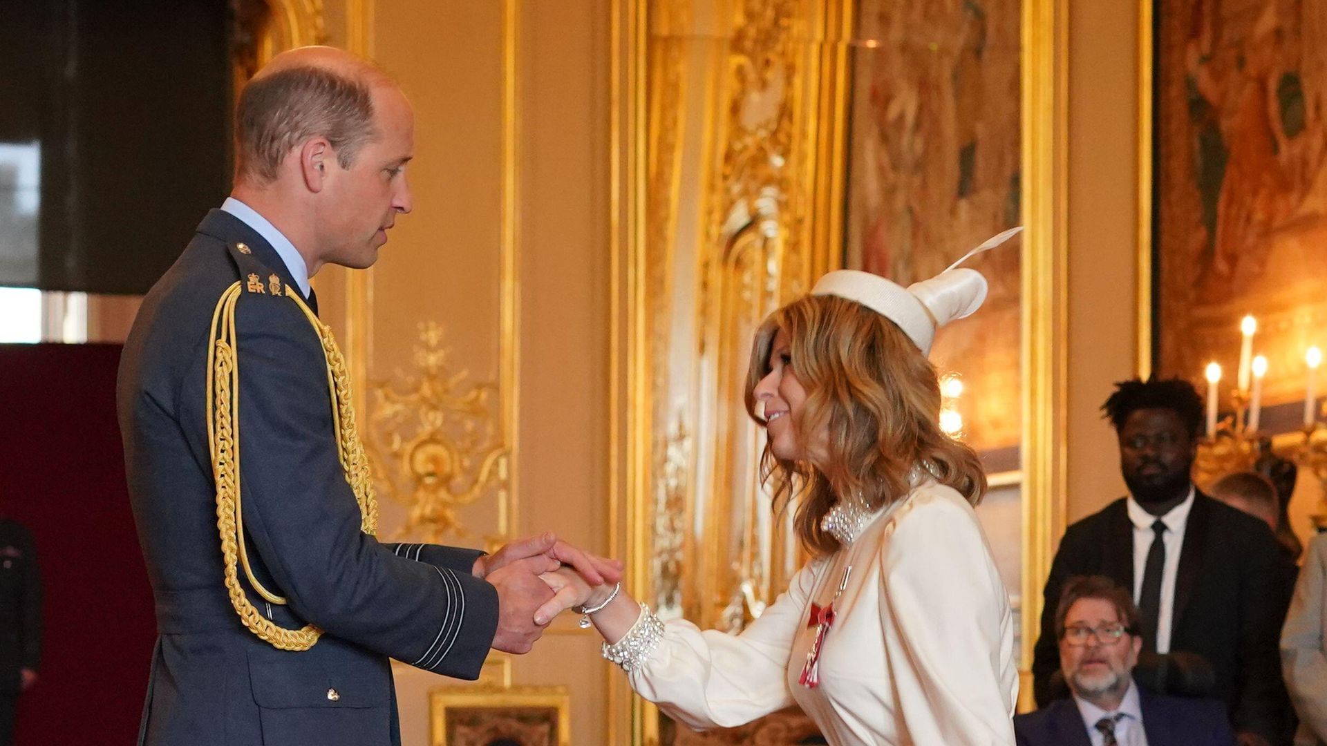 Kate shaking hands with Prince William