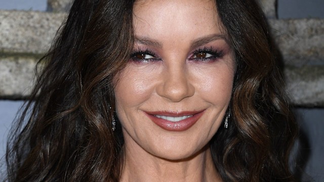 Catherine Zeta-Jones with dark makeup on the red carpet