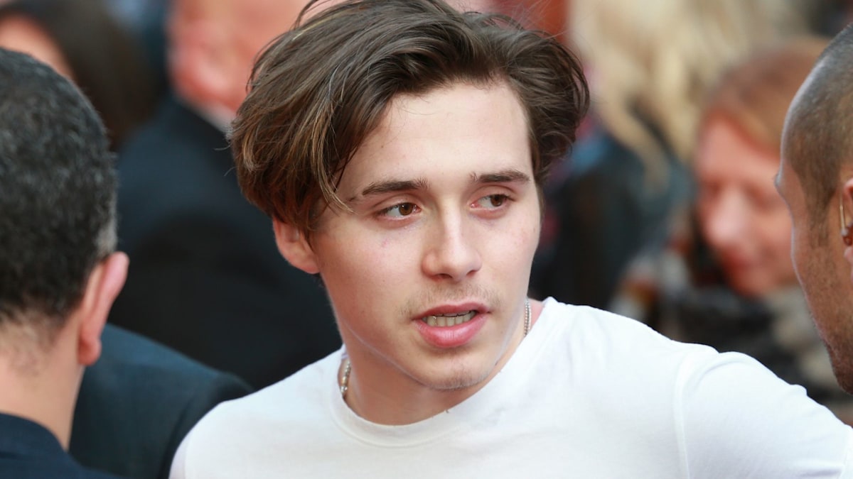 Brooklyn Beckham's former football coach weighs in on 'crackers' life