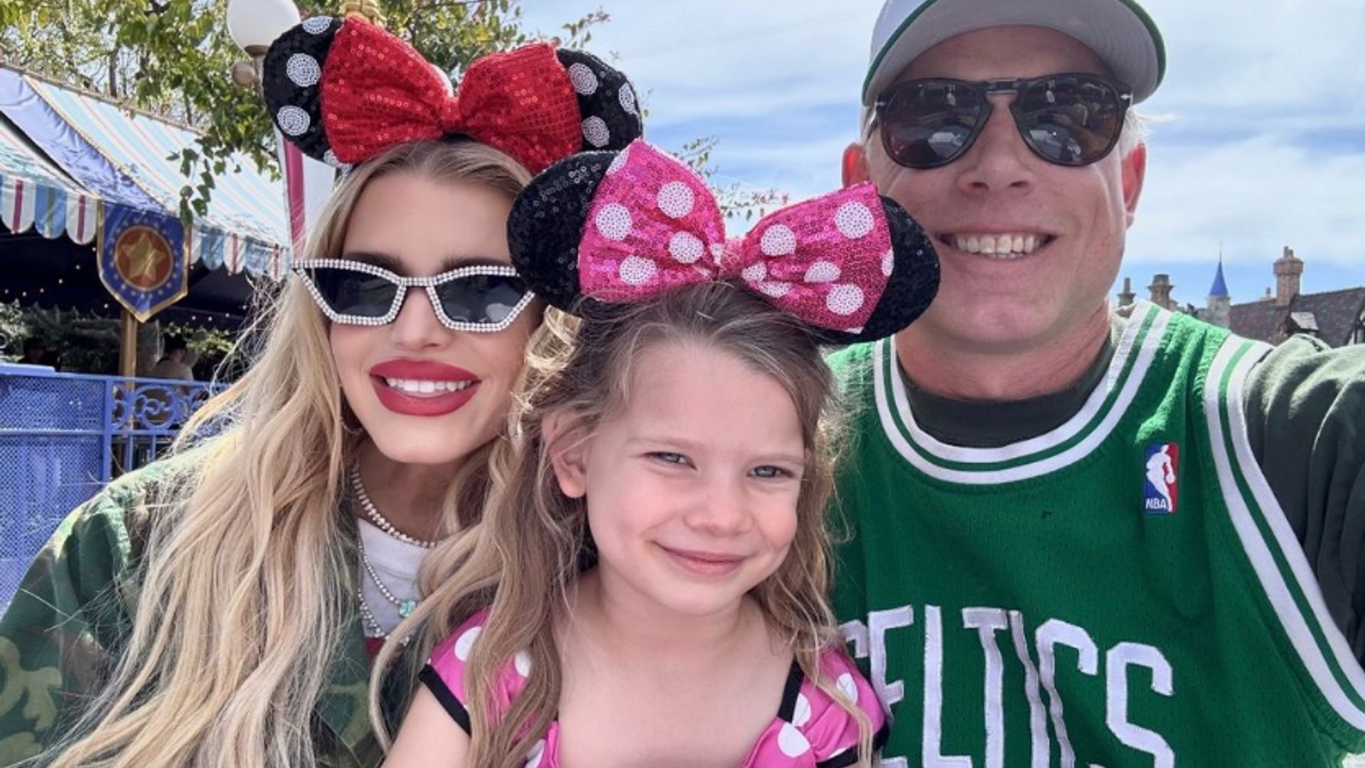 Photo shared by Jessica Simpson to her Instagram Stories March 2024, posing with her husband Eric Johnson and their daughter Birdie Mae, who was celebrating her 5th birthday at Disney