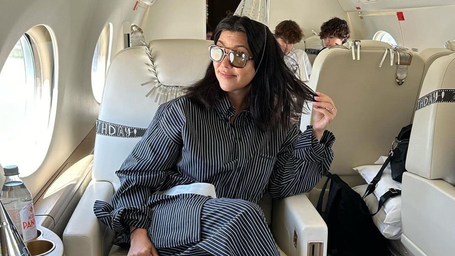 Kourtney Kardashian on private plane