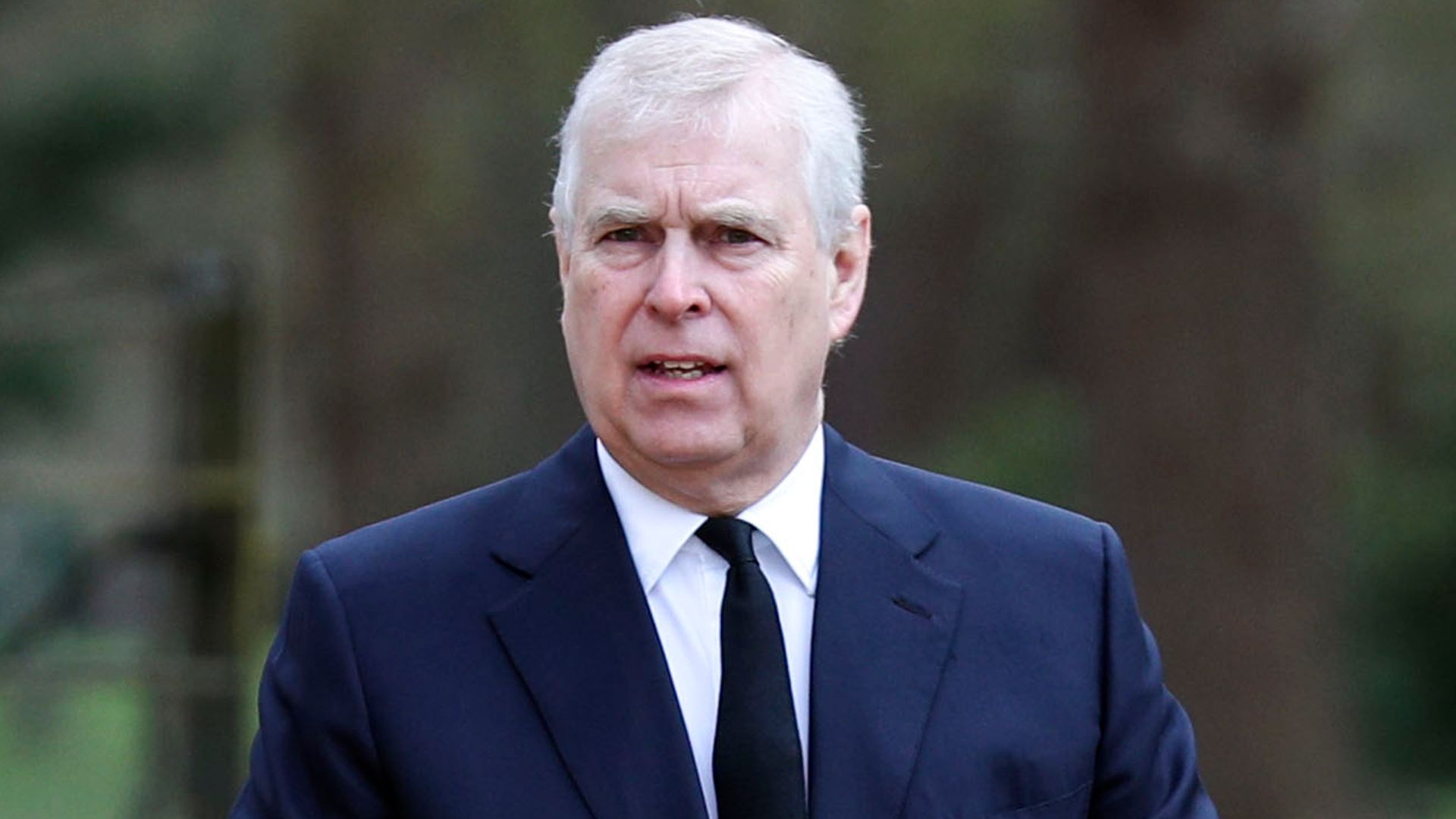 Andrew Mountbatten Windsor in navy suit in April 2021