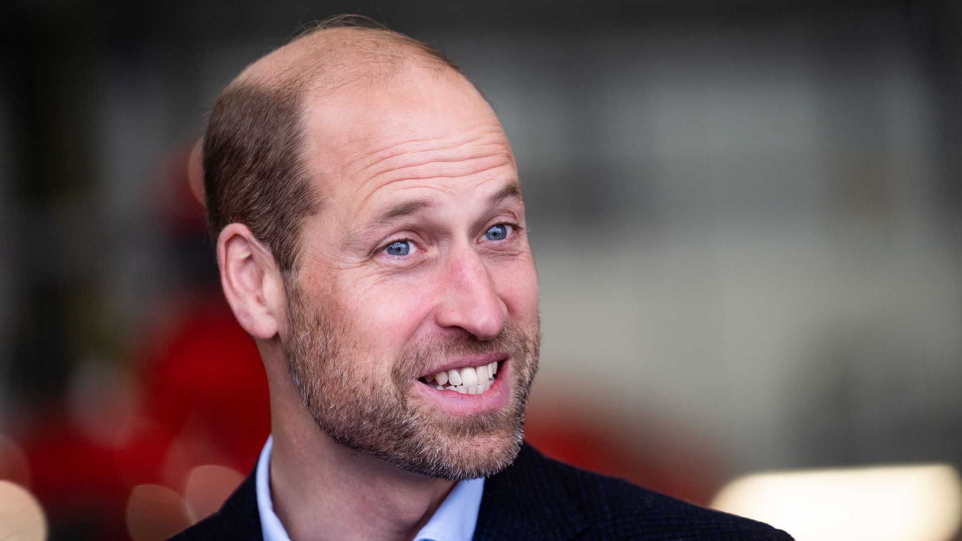 Prince William grinning