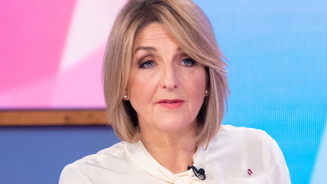 Kaye Adams in a white shirt