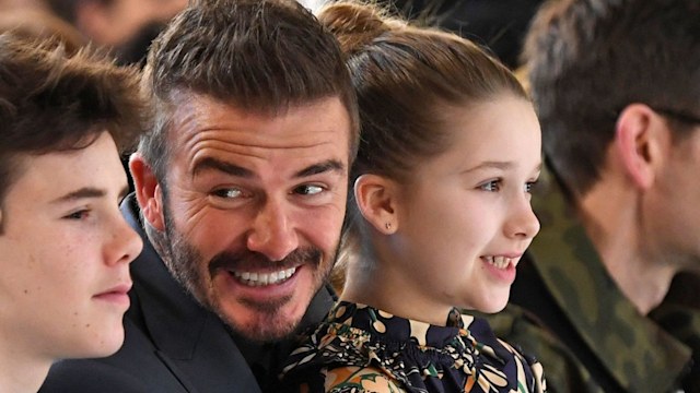 Harper Beckham with her dad David at London Fashion Week 2020