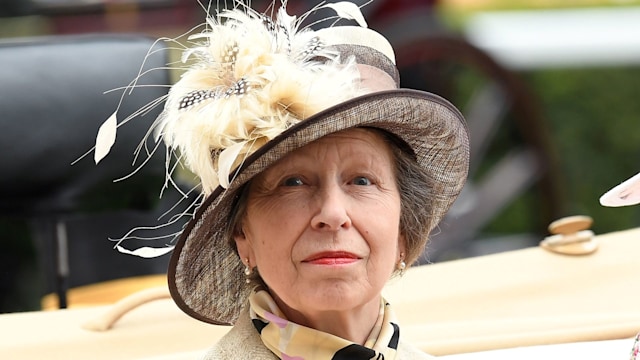 Princess Anne wears a feathered hat