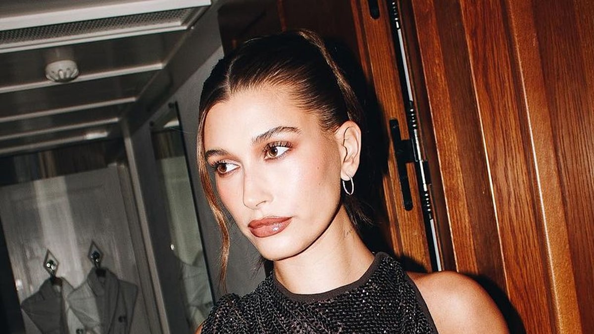 Hailey Bieber looks ethereal in a chic tropical mini dress