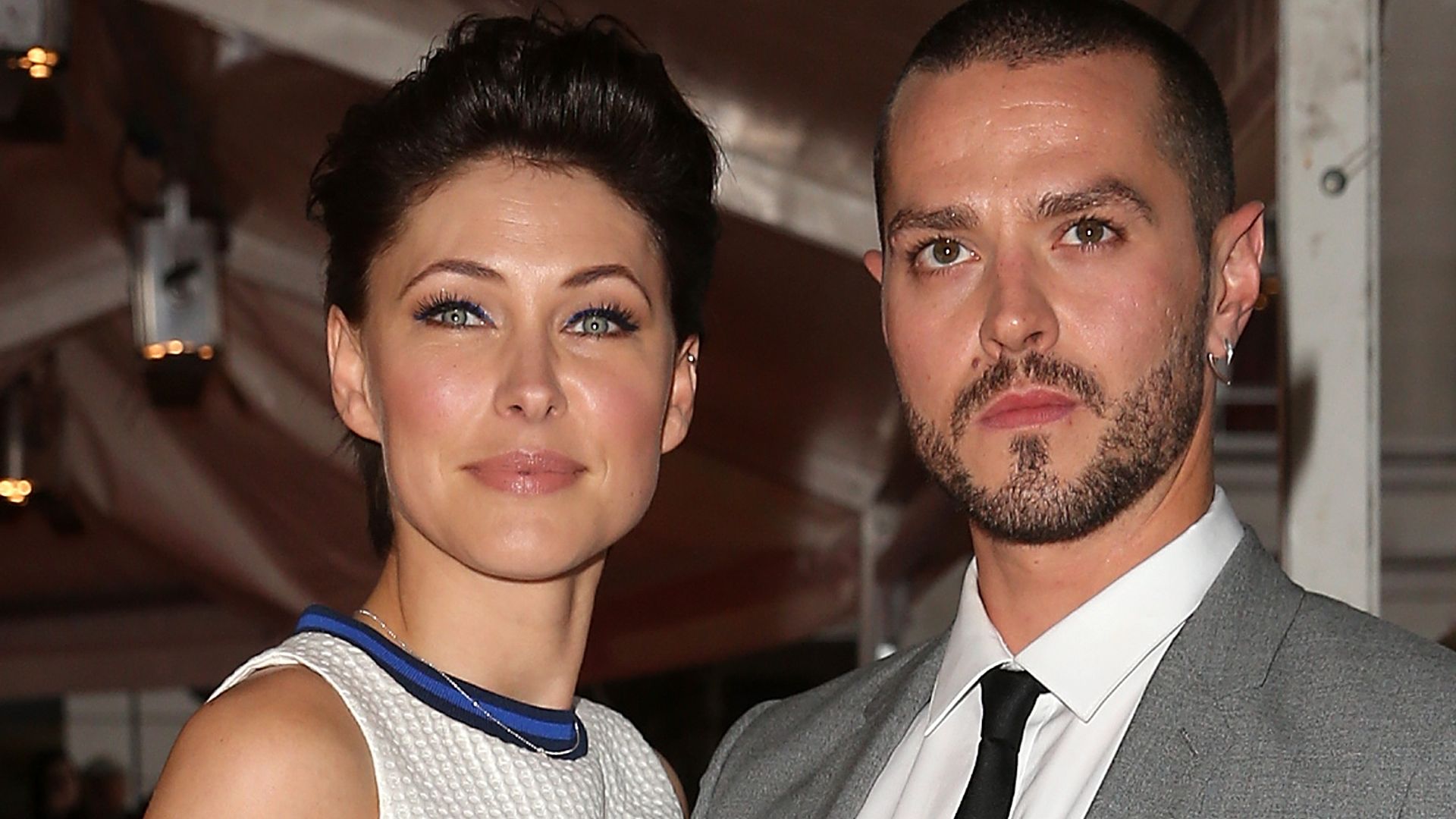 Emma Willis in a white dress and Matt Willis in a grey suit at the Glamour Women Of The Year Awards