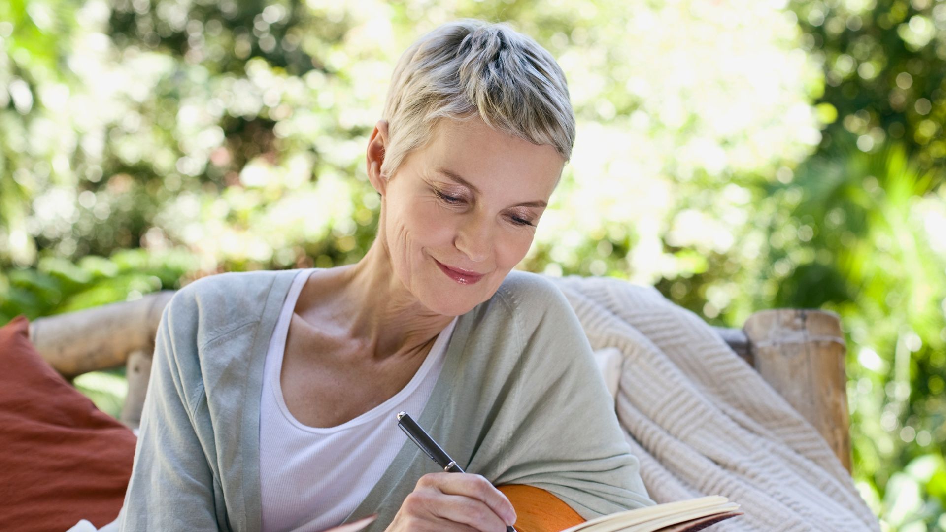 woman writing in diary