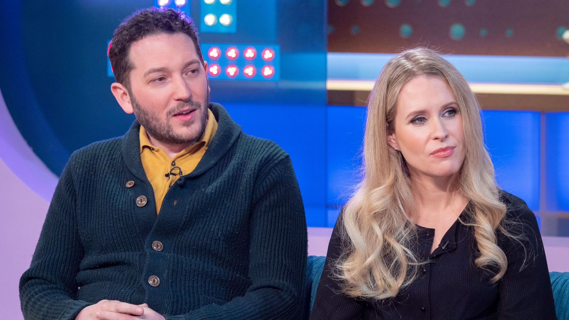 Jon Richardson and Lucy Beaumont with expressionless faces
