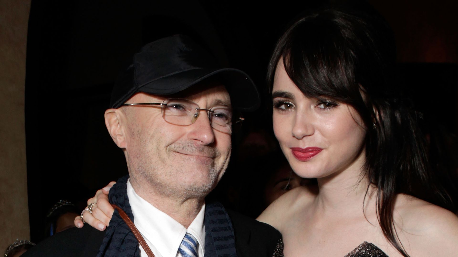 Phil Collins and Actress Lily Collins attend the after party for Relativity Media's "Mirror Mirror" Los Angeles premiere at the Roosevelt Hotel on March 17, 2012 in Hollywood, California
