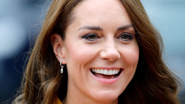 Kate Middleton, the Princess of Wales, wearing a yellow dress at the Royal Surrey County Hospital's Maternity Unit at the Royal Surrey County Hospital on October 5, 2022 in Guildford, England.