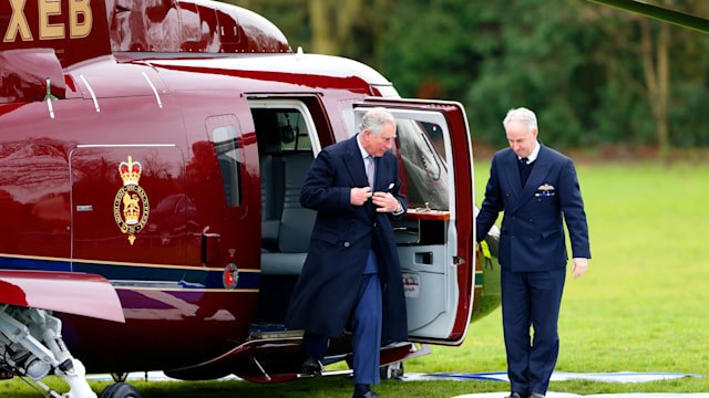 Prince Charles disembarking a Sikorsky Helicopter  in 2014