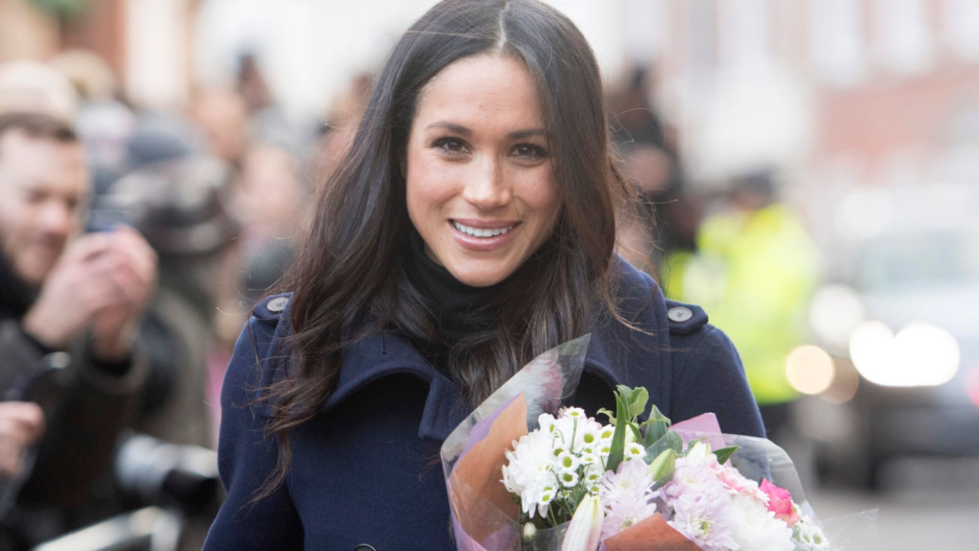 meghan markle at first royal engagement with strathberry bag